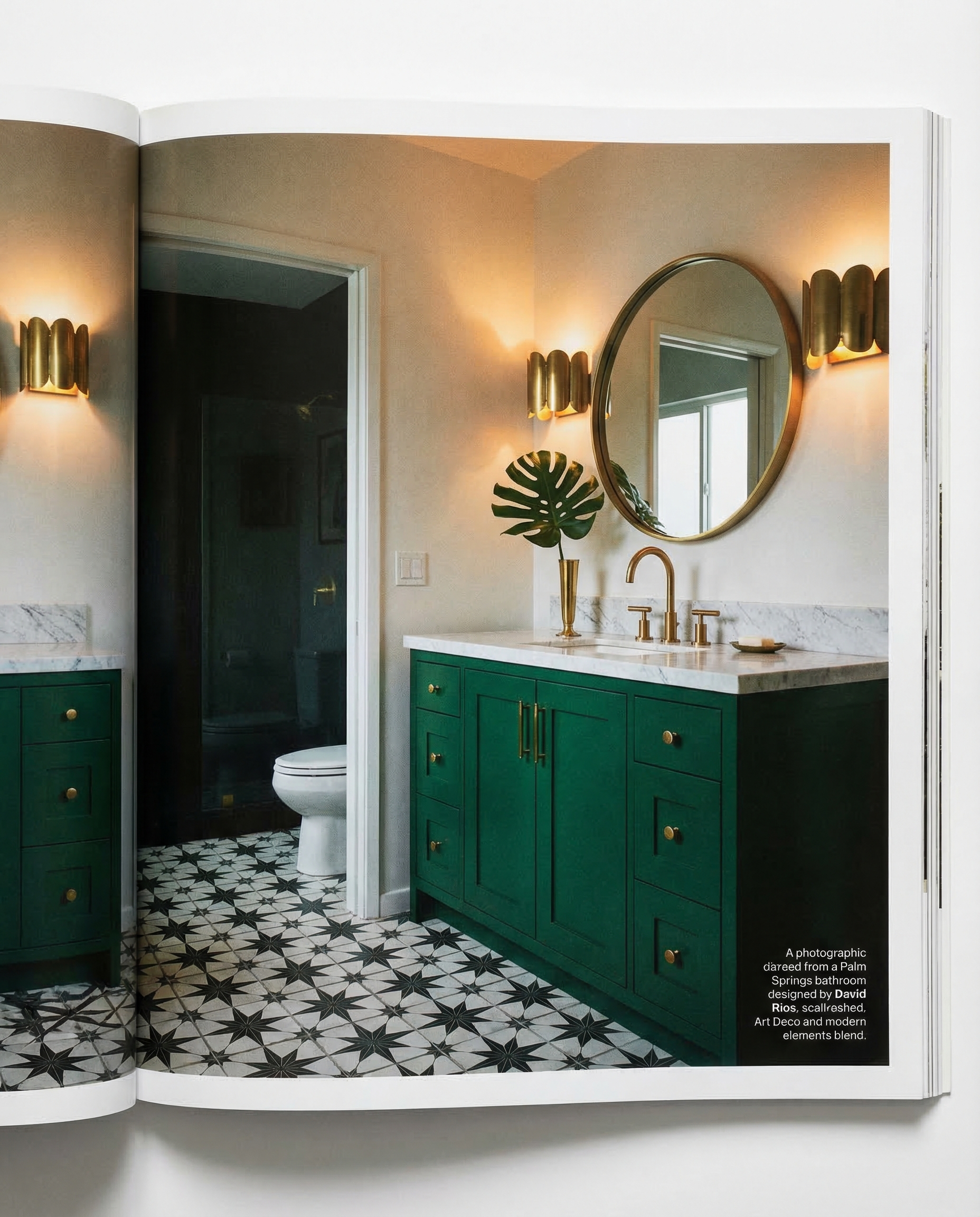 Art deco inspired bathroom with emerald vanity, brass fixtures, and geometric floor tiles — David Rios design aesthetic